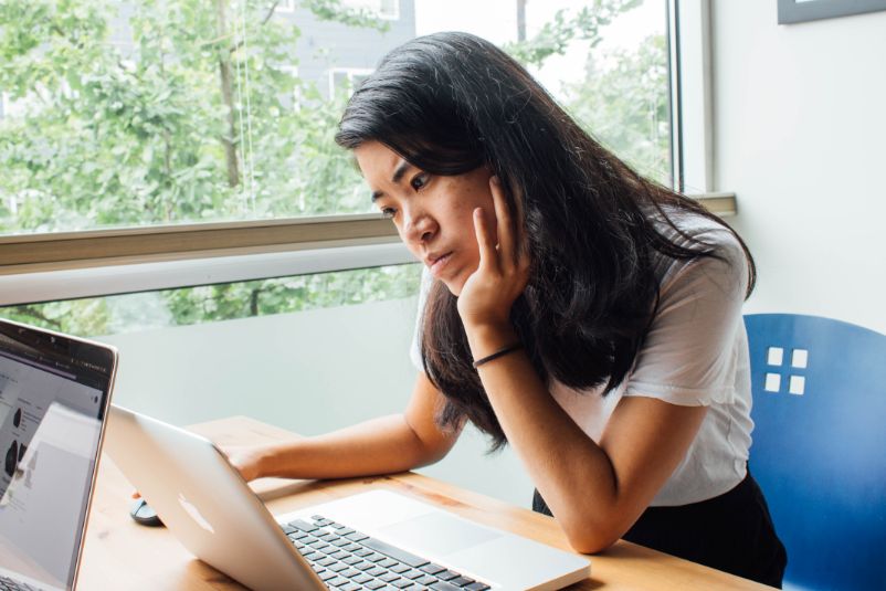 A female adult is learning online